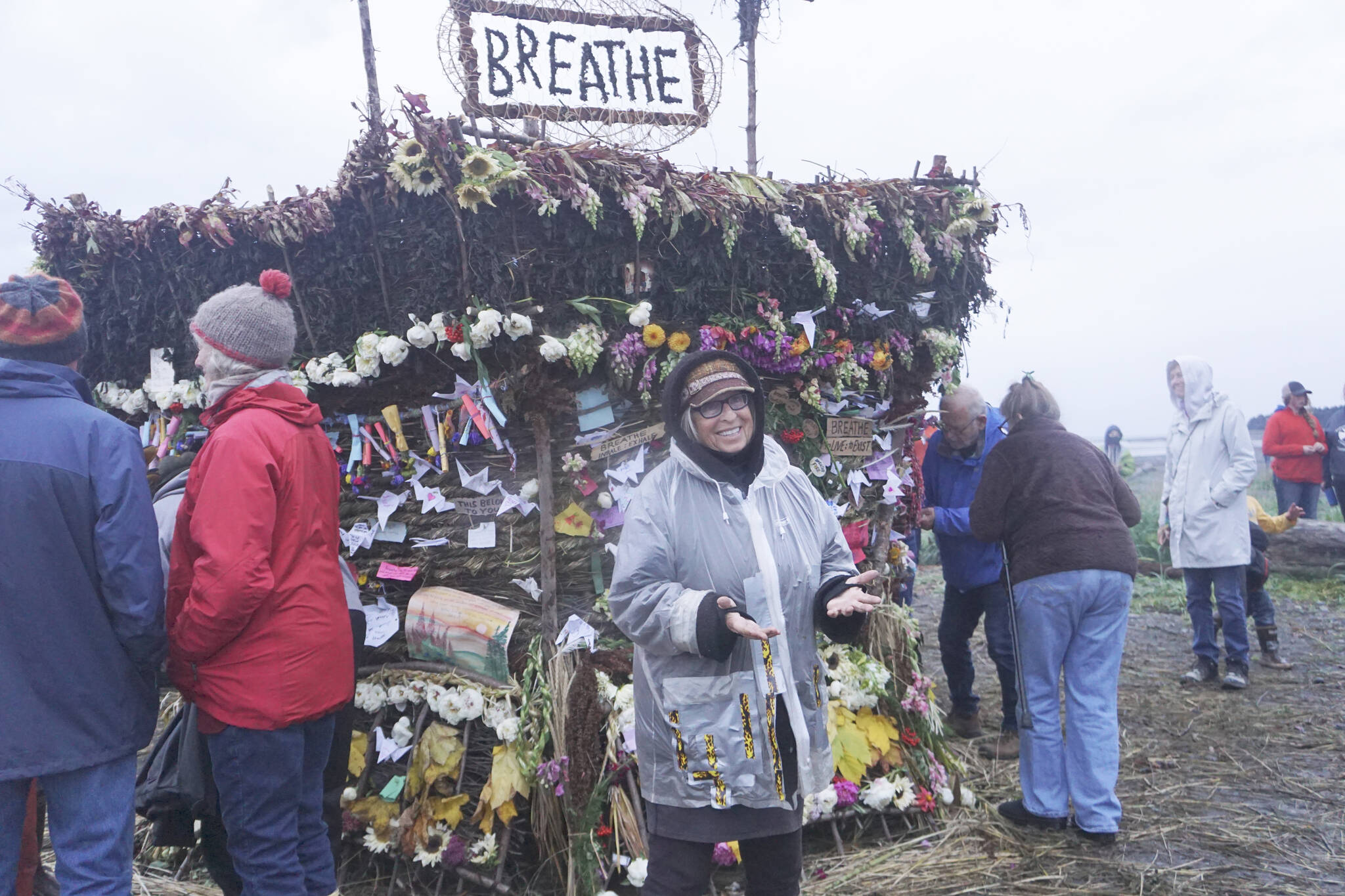 Burning Basket coordinator Mavis Muller stands in front of the 19th annual Burning Basket, “Breathe,” on Sunday, Sept. 11, 2022, at Mariner Park on the Homer Spit in Homer, Alaska. (Photo by Michael Armstrong/Homer News)