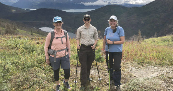 Jaimie Musen and visitors on a Skyline Trail guided hike after a rainstorm. (Photo courtesy of USFWS)
