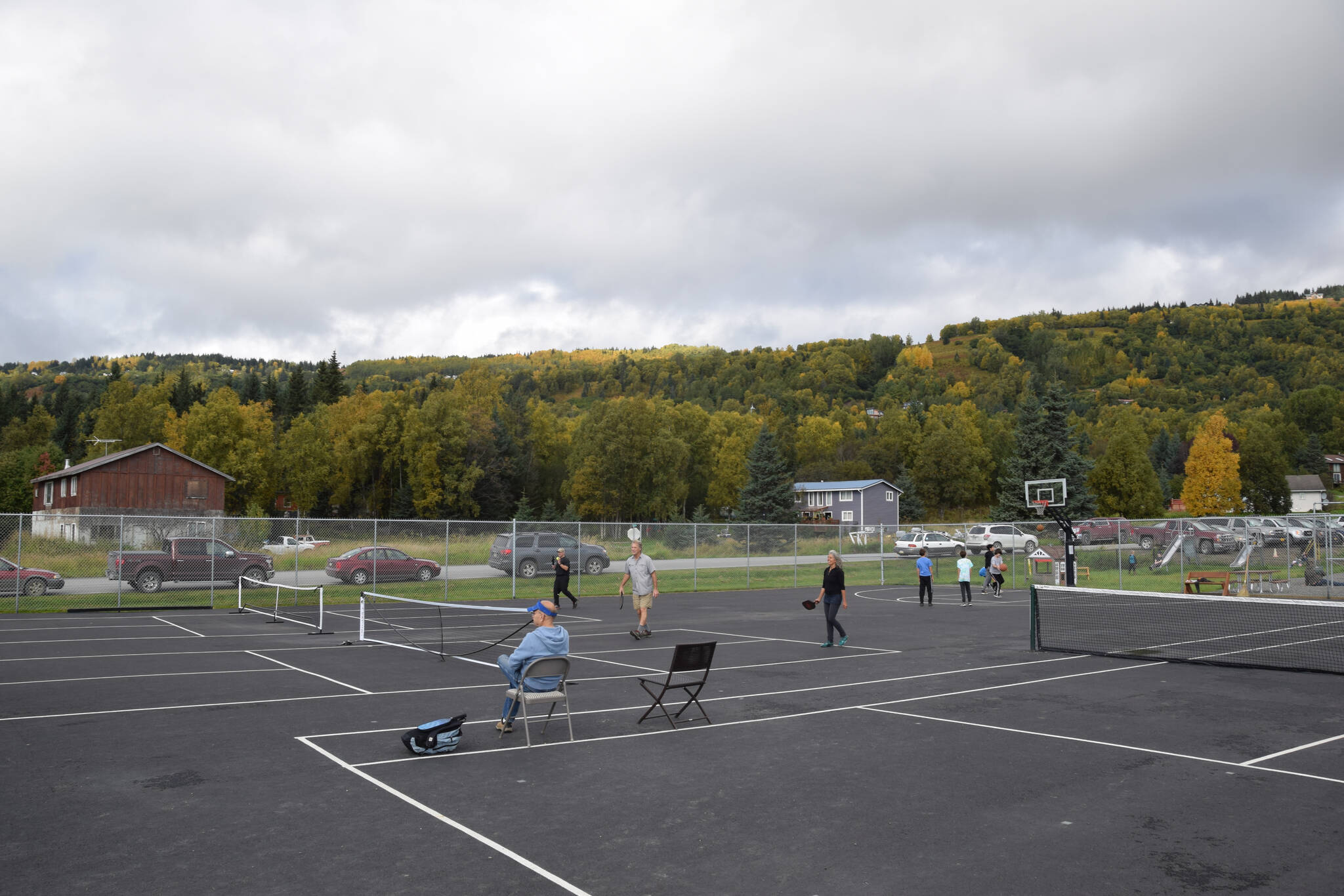 Southern Kenai Peninsula residents make use of the courts at the Kachemak City Park Grand Opening on Saturday, Sept. 17, 2022. (Photo by Charlie Menke / Homer News)