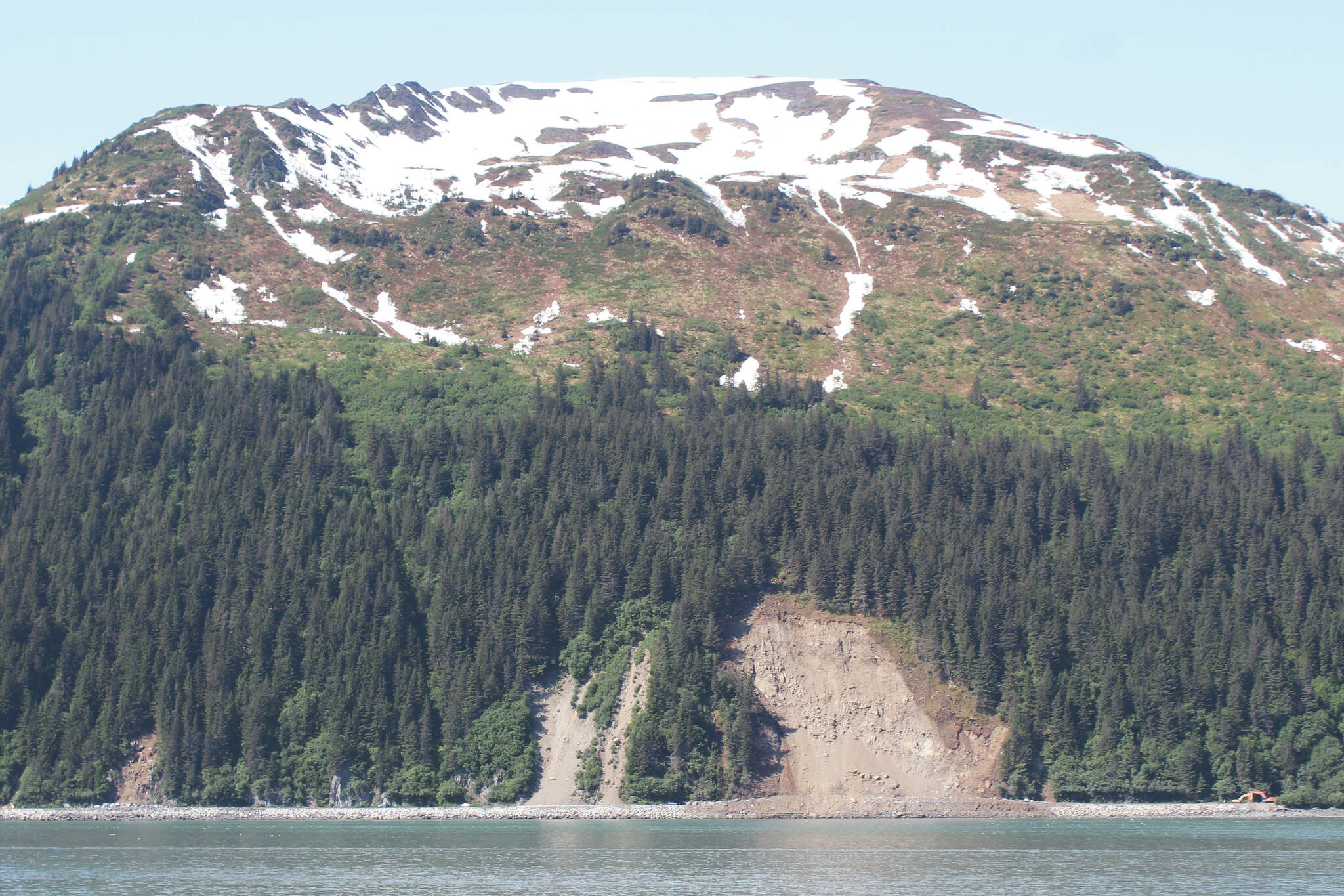 Landslide debris surrounds part of Lowell Point Road on Friday, June 3, 2022 in Seward, Alaska. (Ashlyn O’Hara/Peninsula Clarion)