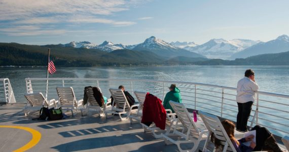 Passengers lounge on the dock of an Alaska Marine Highway System ferry as it departs Juneau in this photo posted Sept. 1 at the AMHS Facebook page. (Alaska State Department of Transportation and Public Facilities)