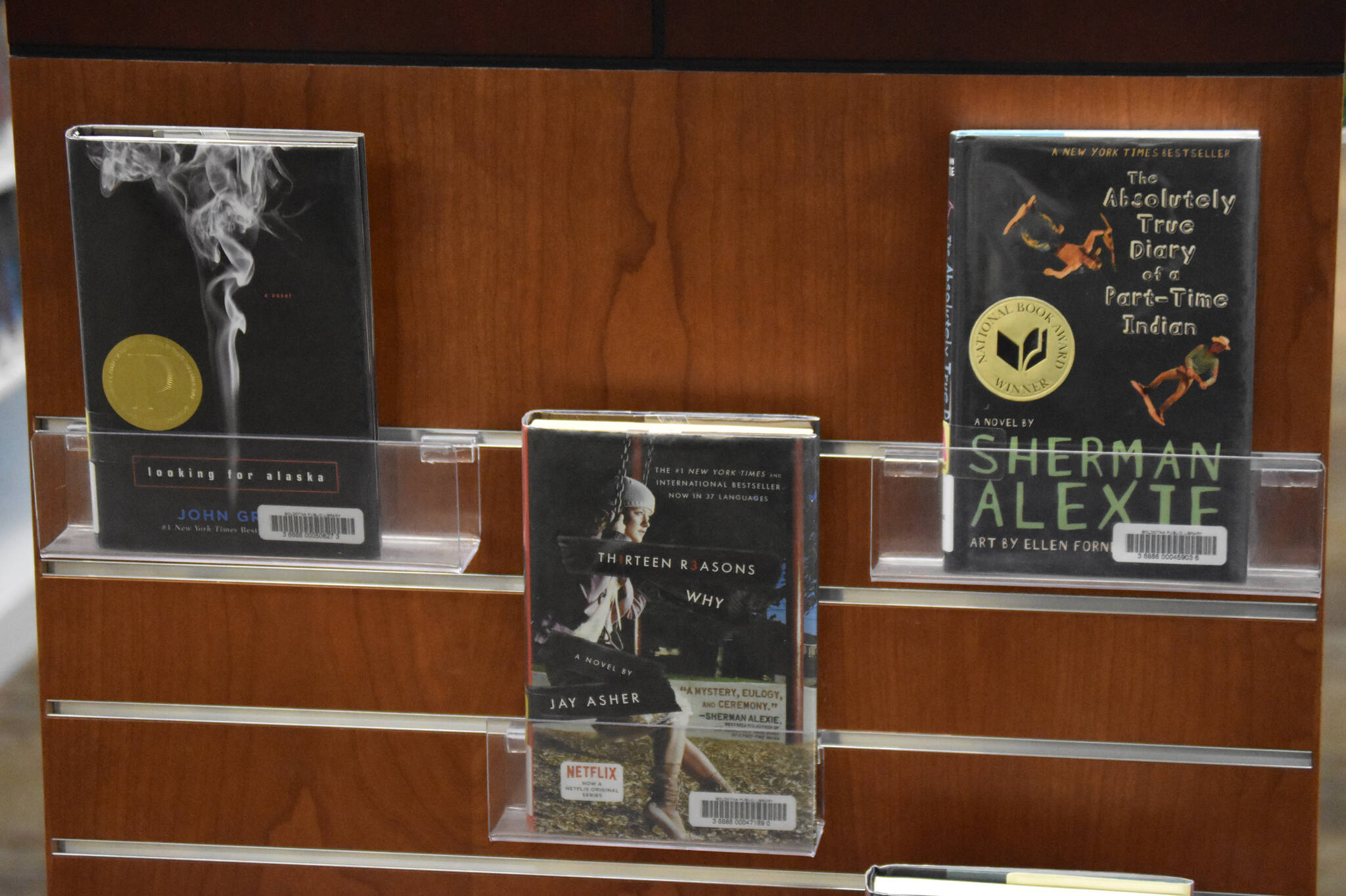 Examples of contemporary books that have been banned or challenged in recent years are displayed on Saturday, Sept. 24, 2022, at the Soldotna Public Library in Soldotna, Alaska. (Jake Dye/Peninsula Clarion)