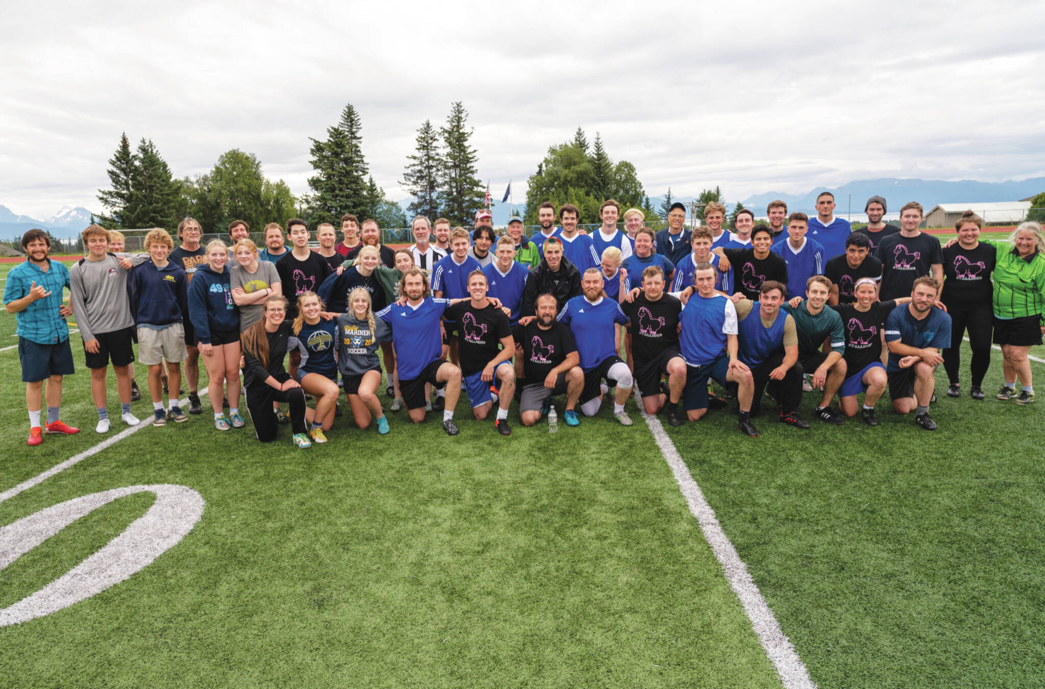 Photo by Uliana Reutov 
Community soccer players after a special match celebrating the life of Drew Brown at Homer High School Field on Aug. 14.
