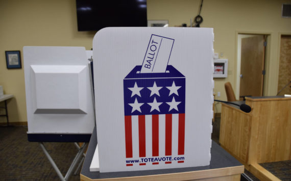 A voting booth for the Kenai Peninsula Borough and City of Homer elections at Cowles Council Chambers on Tuesday, Oct. 4, 2022 in Homer, Alaska. (Photo by Charlie Menke/ Homer News)