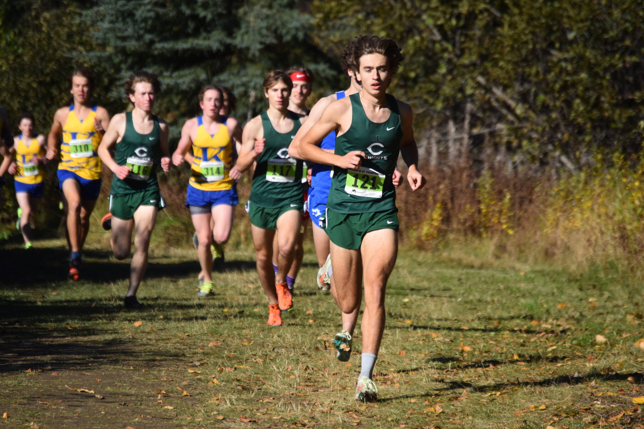 Jake Dye/Peninsula Clarion 
Colony’s Matthew Rongitsch leads the Region 3/Division I boys race on Saturday, just outside of Tsalteshi Trails in Soldotna.