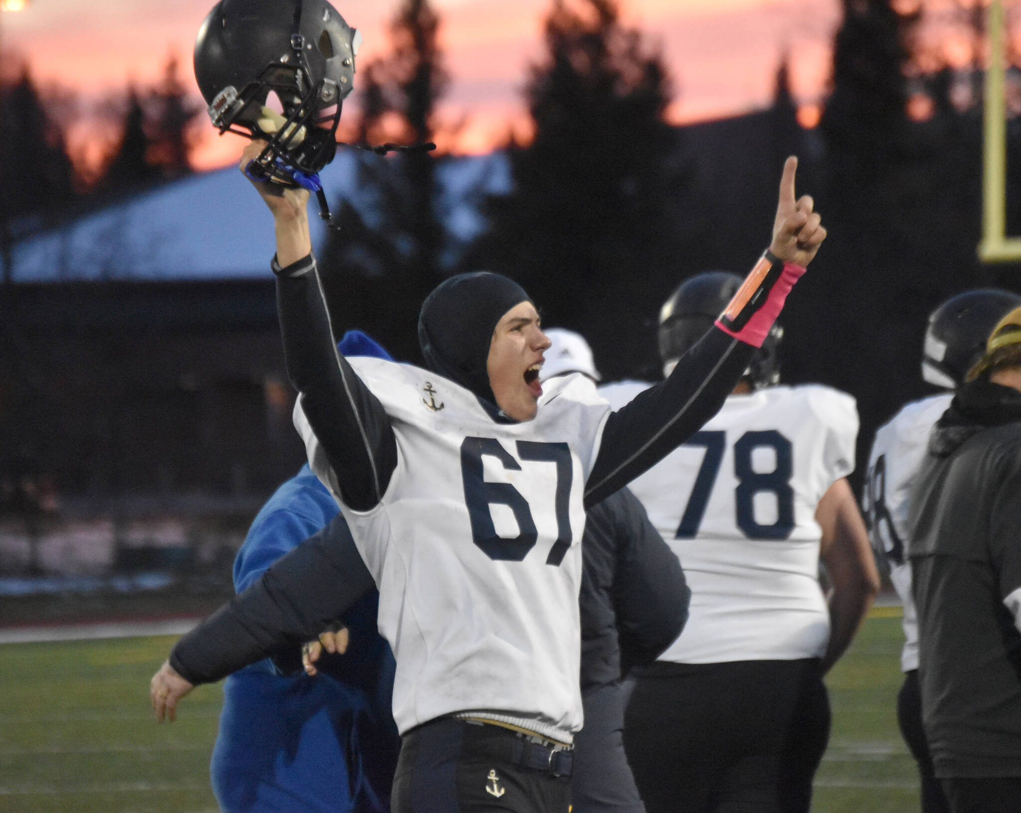 Homer’s Owen Storm celebrates Saturday, Oct. 15, 2022, at the Division III state championship game at Service High School in Anchorage, Alaska. (Photo by Jeff Helminiak/Peninsula Clarion)