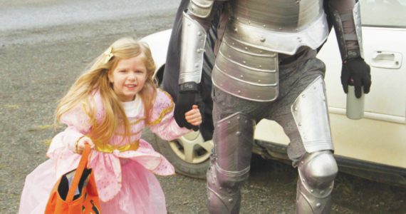 Photo by Sarah Knapp/Homer News file 
A princess and her knight in shining armor trick-or-treat on Bayview Avenue on Sunday, Oct. 31, 2021.