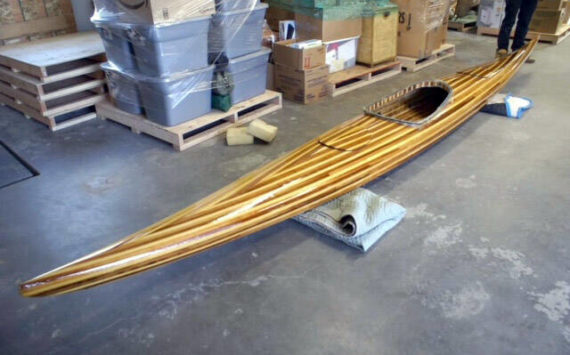 The cedar-built kayak Nate Grinnell built to follow the voyageur’s journey. (Photo by Julie Grinnell)