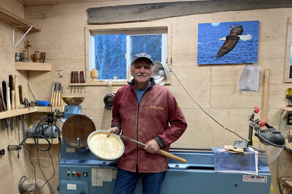Bruce Robinson shows some of his work at his shop that will be displayed at Grace Ridge Brewing this month. (Photo provided)