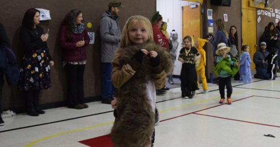 Selma, a squirrel, squeaks through the Paul Banks Elementary Halloween Parade on Monday, Oct. 31, 2022 in Homer, Alaska. (Photo by Charlie Menke / Homer News)