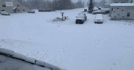 Snow falls around the Peninsula Clarion building on Tuesday, Oct. 25, 2022 in Kenai, Alaska. (Ashlyn O’Hara/Peninsula Clarion)