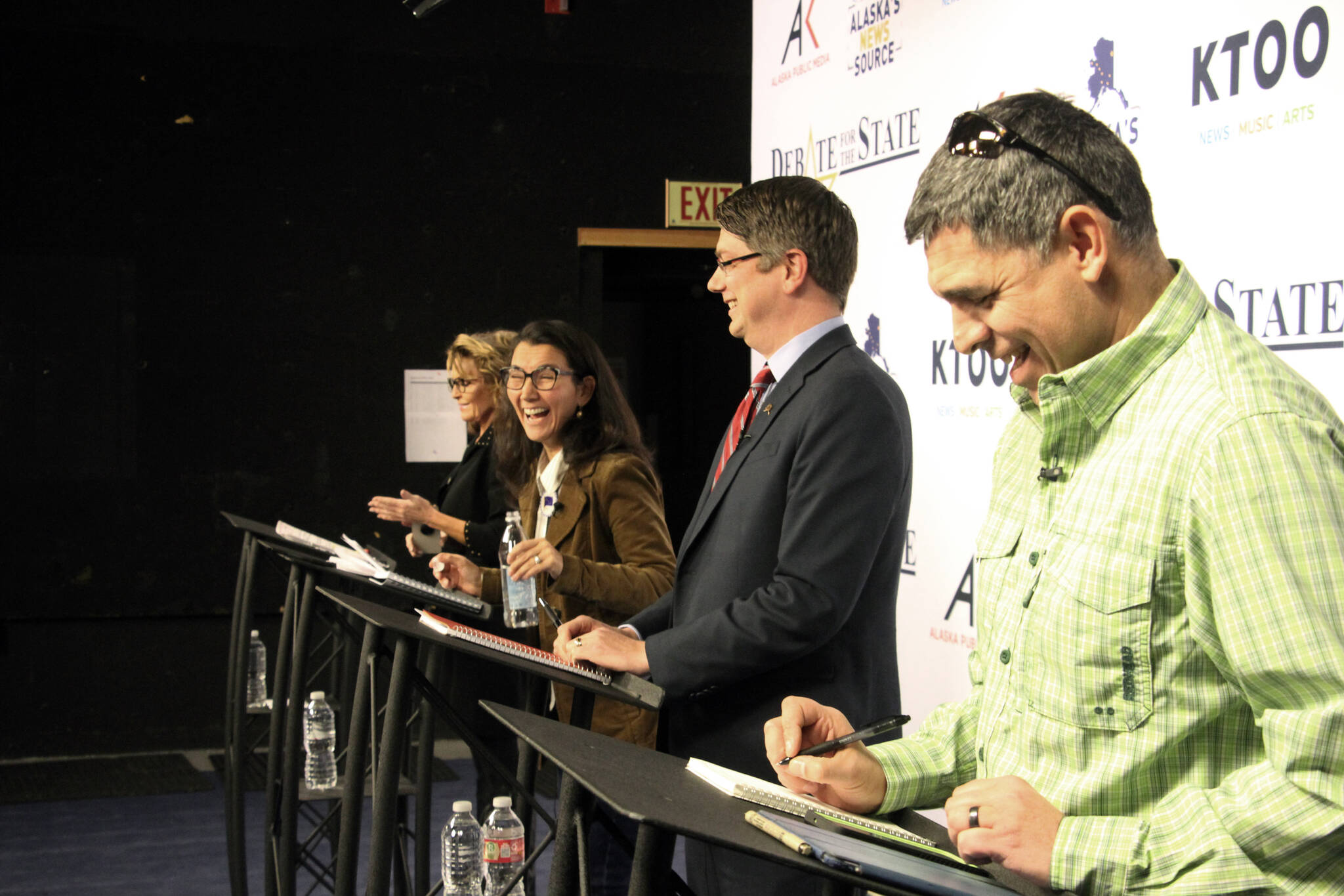 Candidates for Alaska’s sole U.S. House seat share a laugh before a debate Wednesday, Oct. 26, 2022, in Anchorage, Alaska. From left are Republican Sarah Palin, U.S. Rep. Mary Peltola, a Democrat; Republican Nick Begich, and Chris Bye, a Libertarian. (AP Photo/Mark Thiessen)