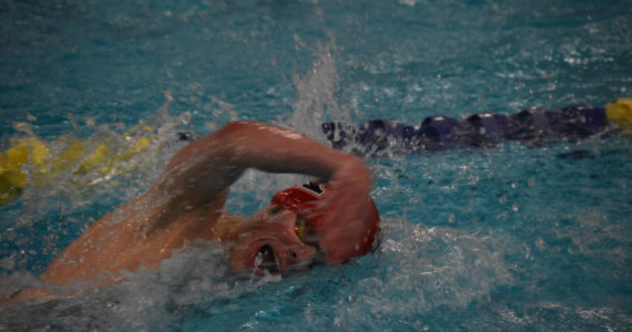 Samuel Anderson, of Kenai, swims the 200-yard freestyle during finals at the ASAA State Swim & Dive Championships on Saturday, Nov. 5, 2022, at Bartlett High School in Anchorage, Alaska. (Jake Dye/Peninsula Clarion)