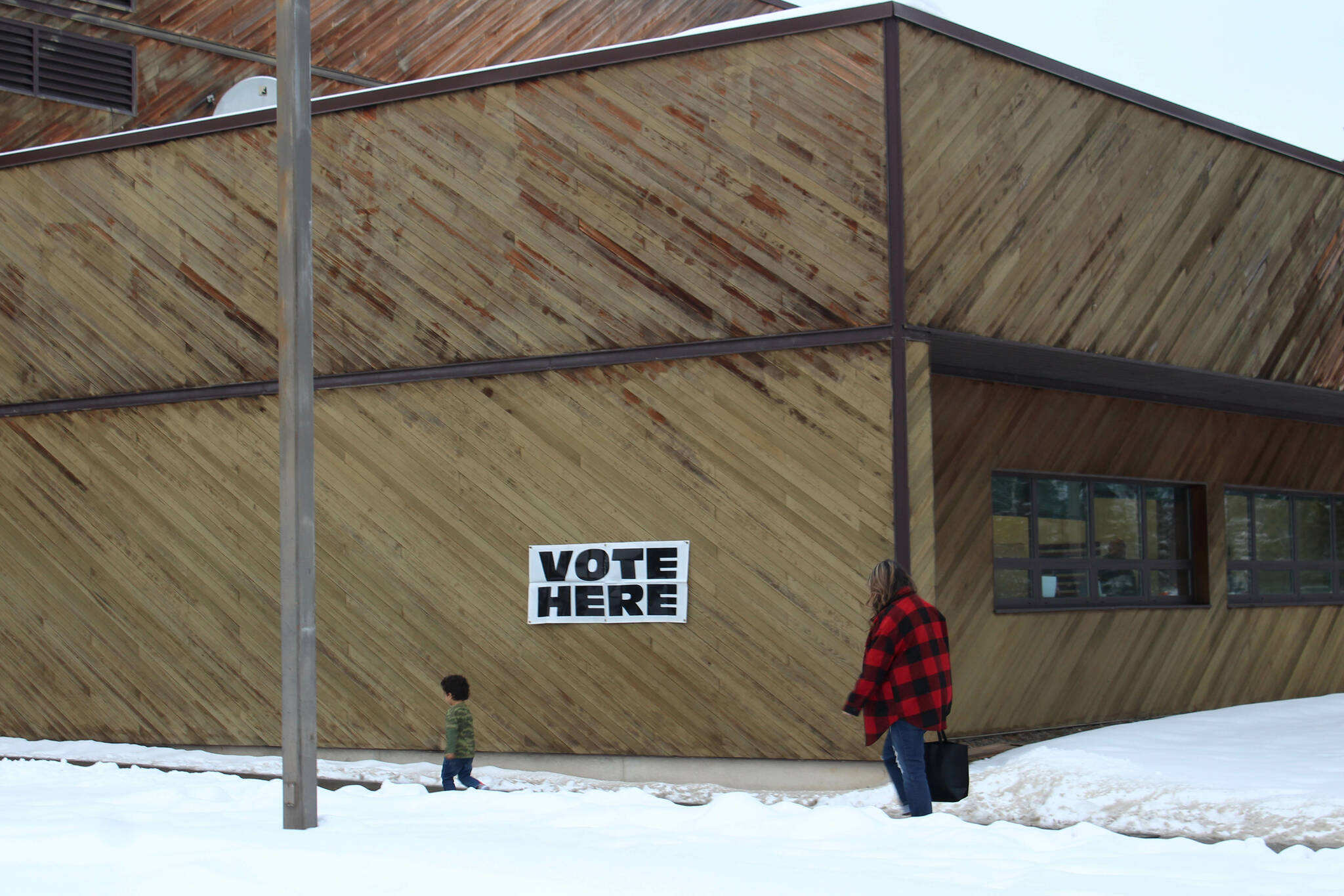 A voter walks into the Soldotna Regional Sports Complex, the location of the Central and K-Beach precincts, on Tuesday, Nov. 8, 2022 in Soldotna, Alaska. (Ashlyn O'Hara/Peninsula Clarion)