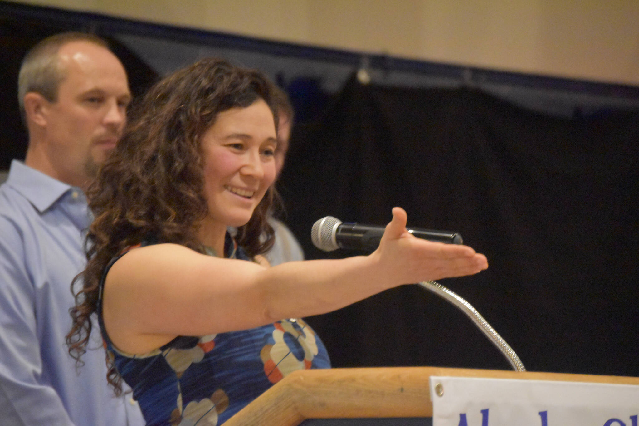 Tela O’Donnell-Bacher speaks while being inducted to the National Wrestling Hall of Fame following the duel wrestling meet on Tuesday, Nov. 22, 2022, at Soldotna High School in Soldotna, Alaska. (Jake Dye/Peninsula Clarion)
