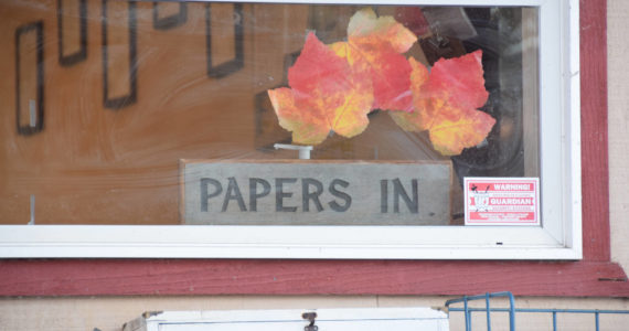Papers are in at the Homer News building on Thursday, Dec. 1 in Homer. (Photo by Charlie Menke / Homer News)