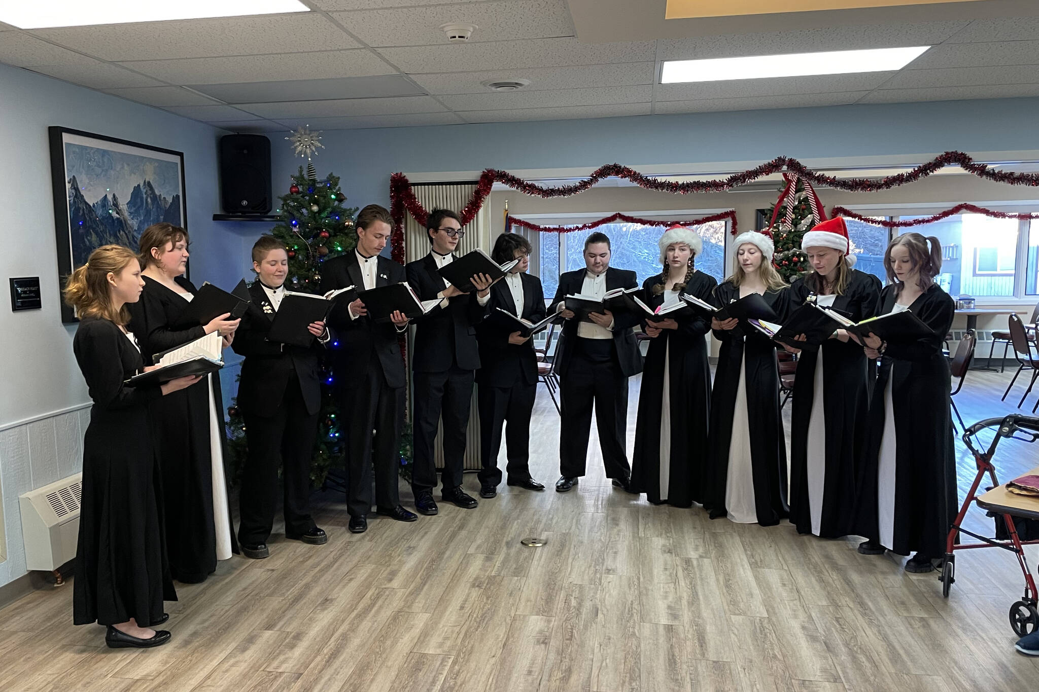The Homer High School Swing Choir performs at the Homer Senior Center on Dec. 9, 2022 in Homer, Alaska. (Photo by Kyle Schneider)