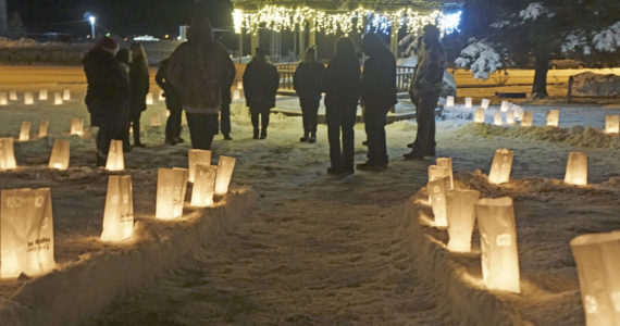 People gather for Light Up a Life on Thursday, Dec. 15, 2022, at WKFL Park in Homer, Alaska. (Photo by Michael Armstrong/Homer News)