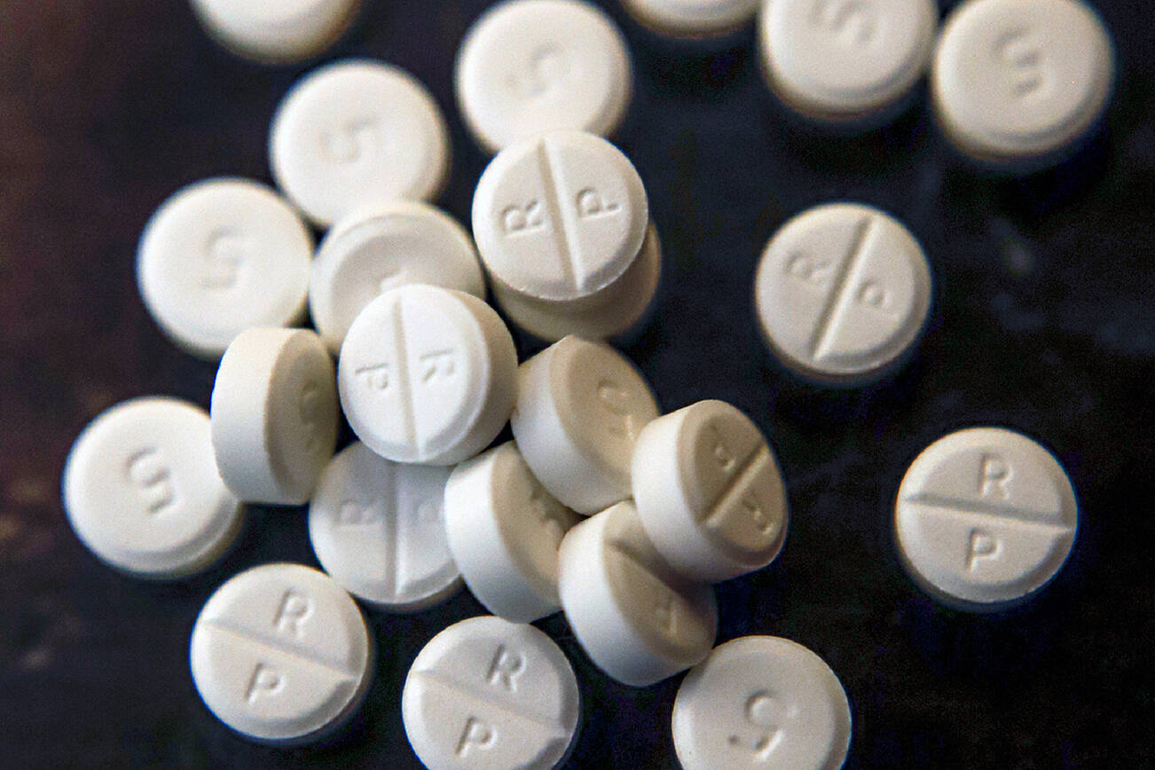 This Monday, June 17, 2019, file photo shows 5-mg pills of Oxycodone. (AP Photo/Keith Srakocic, File)