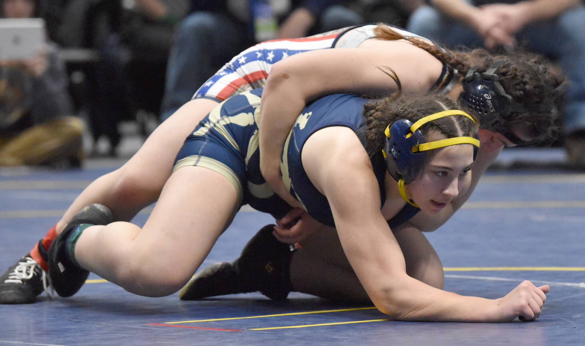 Photo by Jeff Helminiak/Peninsula Clarion 
Homer’s Roane Cook defeats North Pole’s Lylah Murrah for the Girls state title at 185 pounds Saturday, Dec. 18, 2022, at the state wrestling tournament at the Alaska Airlines Center in Anchorage, Alaska.