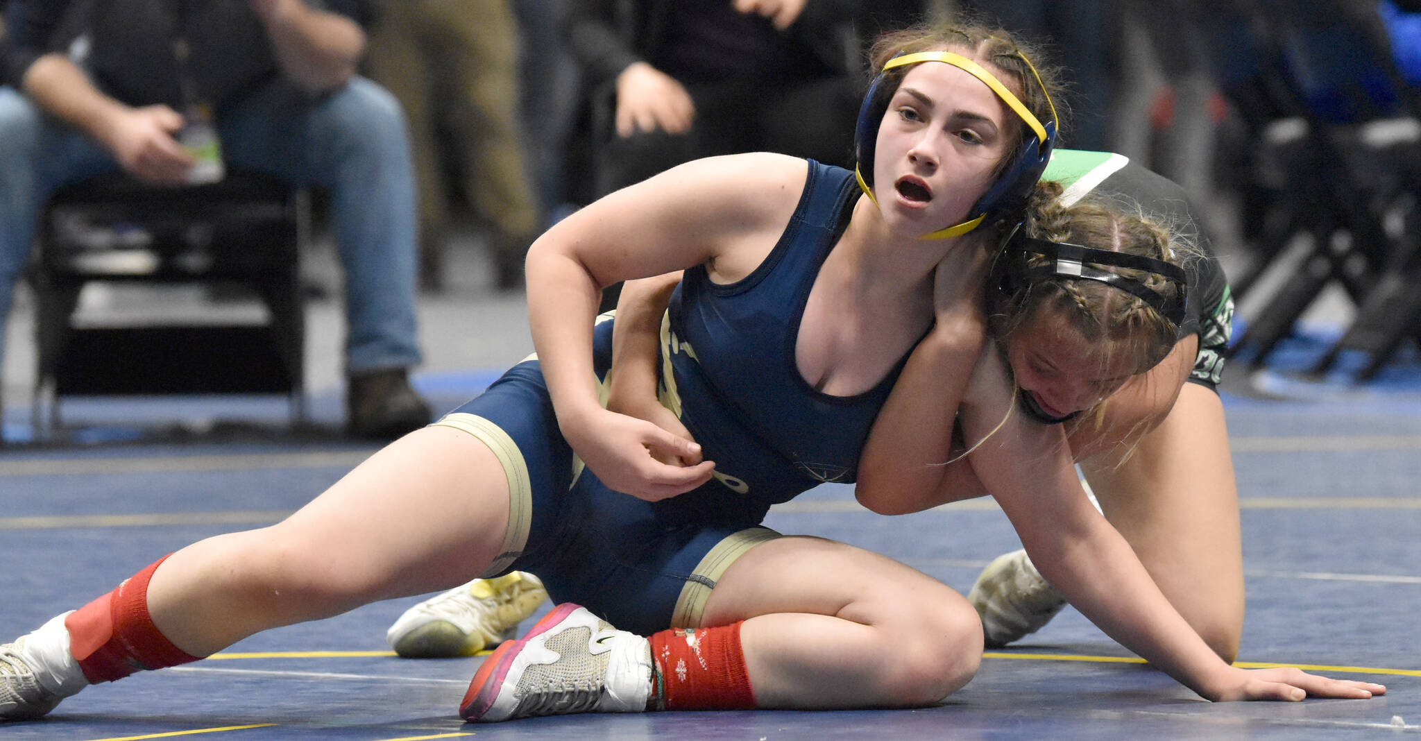 Photo by Jeff Helminiak/Peninsula Clarion 
Homer’s Saoirse Cook defeats Colony’s Bayleigh Harrington for the Girls state title at 126 pounds Saturday, Dec. 18, 2022, at the state wrestling tournament at the Alaska Airlines Center in Anchorage, Alaska.