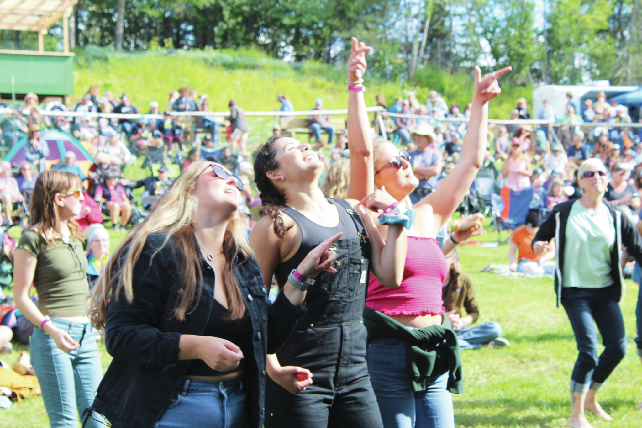 People gather in Ninilchik on Friday, Aug. 5 for Salmonfest, an annual event that raises awareness about salmon-related causes. (Camille Botello/Peninsula Clarion)