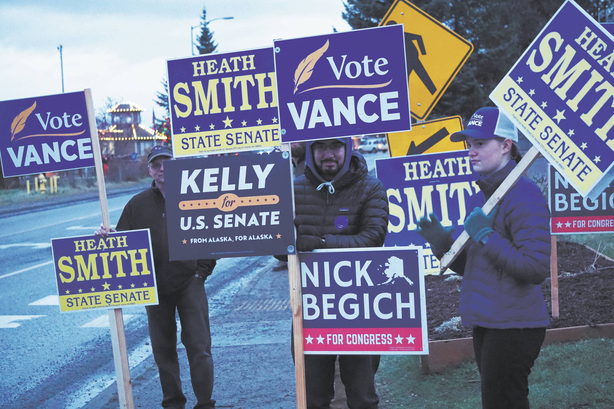 Republican Party supporters wave signs on Tuesday, Nov. 8 on Pioneer Avenue in support of Republican Party candidates Rep. Sarah Vance, R-Homer, Heath Smith, running for State Senate District C, Kelly Tshibaka, running for U.S. Senate, and Nick Begich III, running for U.S. Congress. (Photo by Michael Armstrong/Homer News)