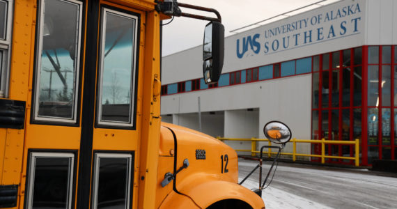 A school bus sits in the parking lot of the University of Southeast Alaska Tech Center downtown. In the fall of 2024, a new commercial driver’s license education training program is expected to be offered at the campus. (Clarise Larson / Juneau Empire)
