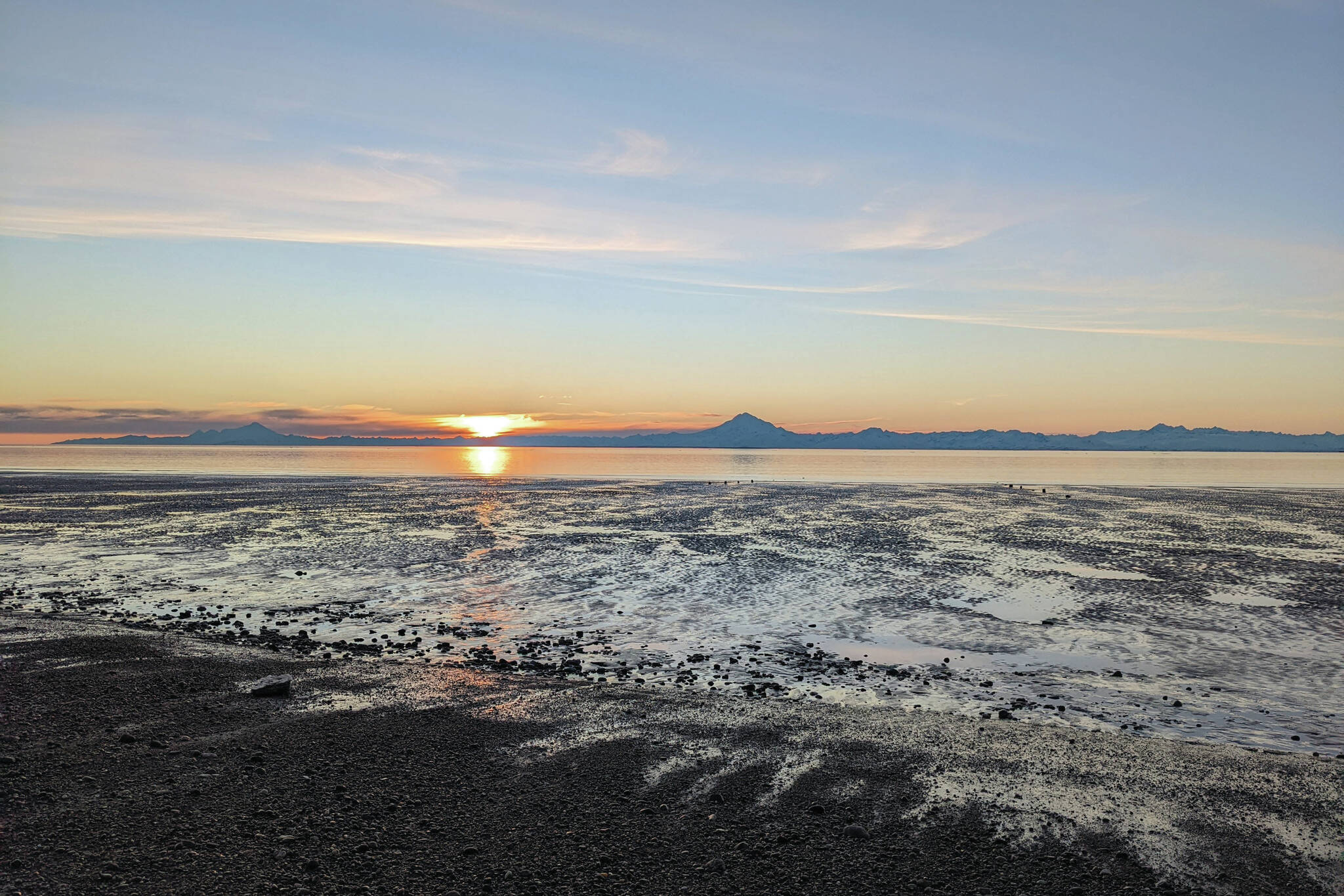Peninsula Clarion File
Mounts Iliamna and Redoubt are seen at sunset on Feb. 22, 2022, in Kenai.