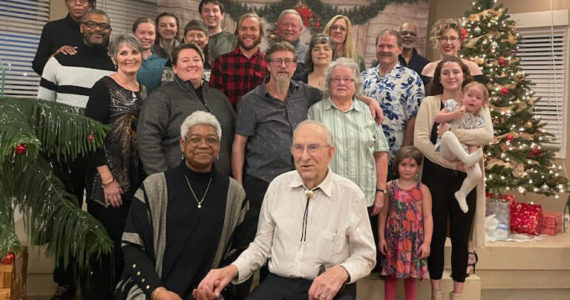 Jake McLay and his wife, Norma, celebrate his 100th birthday with relatives at Land's End in Homer, Jan. 7, 2023. (Photo courtesy McLay family)