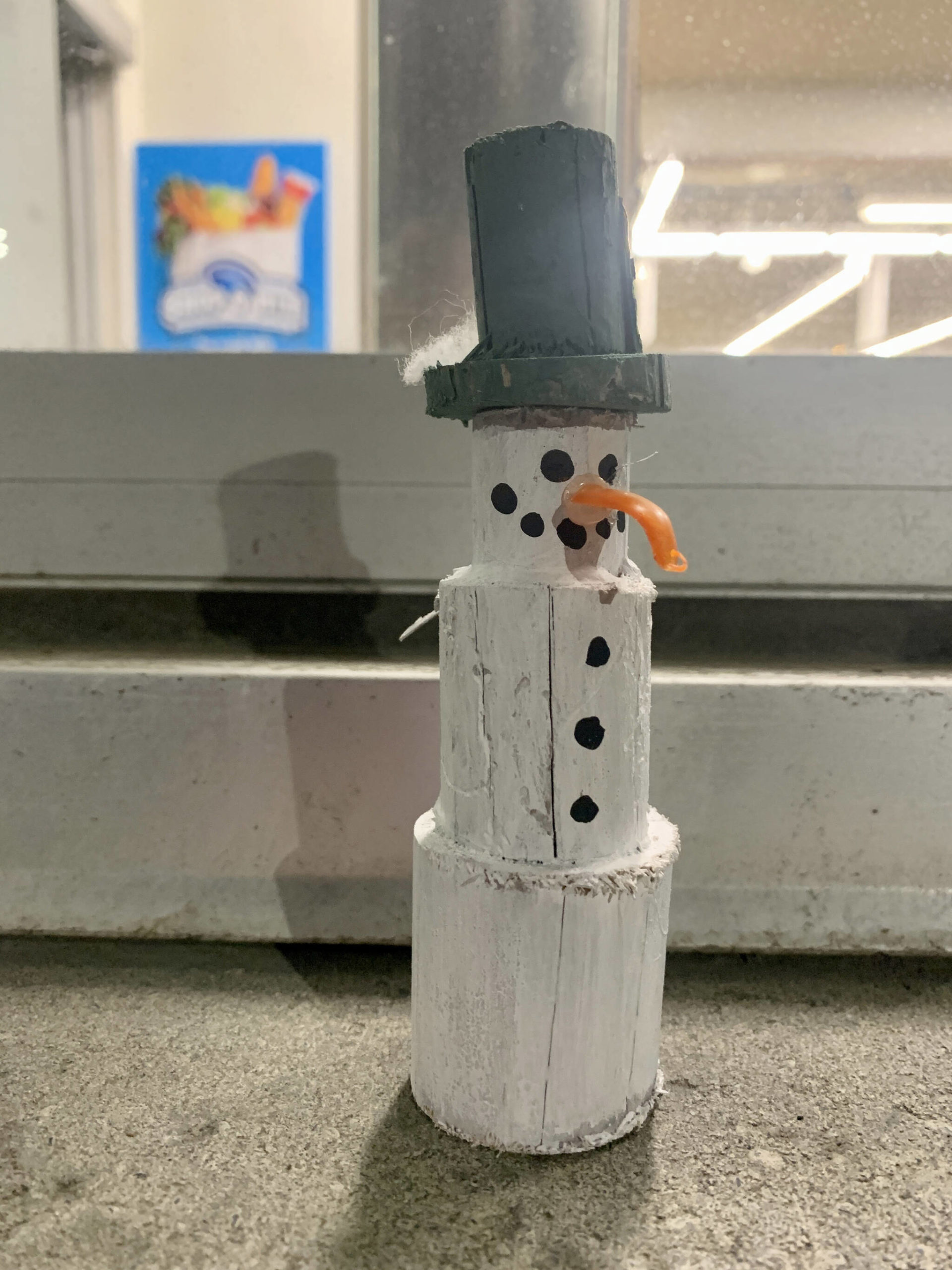 Painted wooden snowmen of various sizes and colors have been placed around town (Photo by Christina Whiting/Homer News)