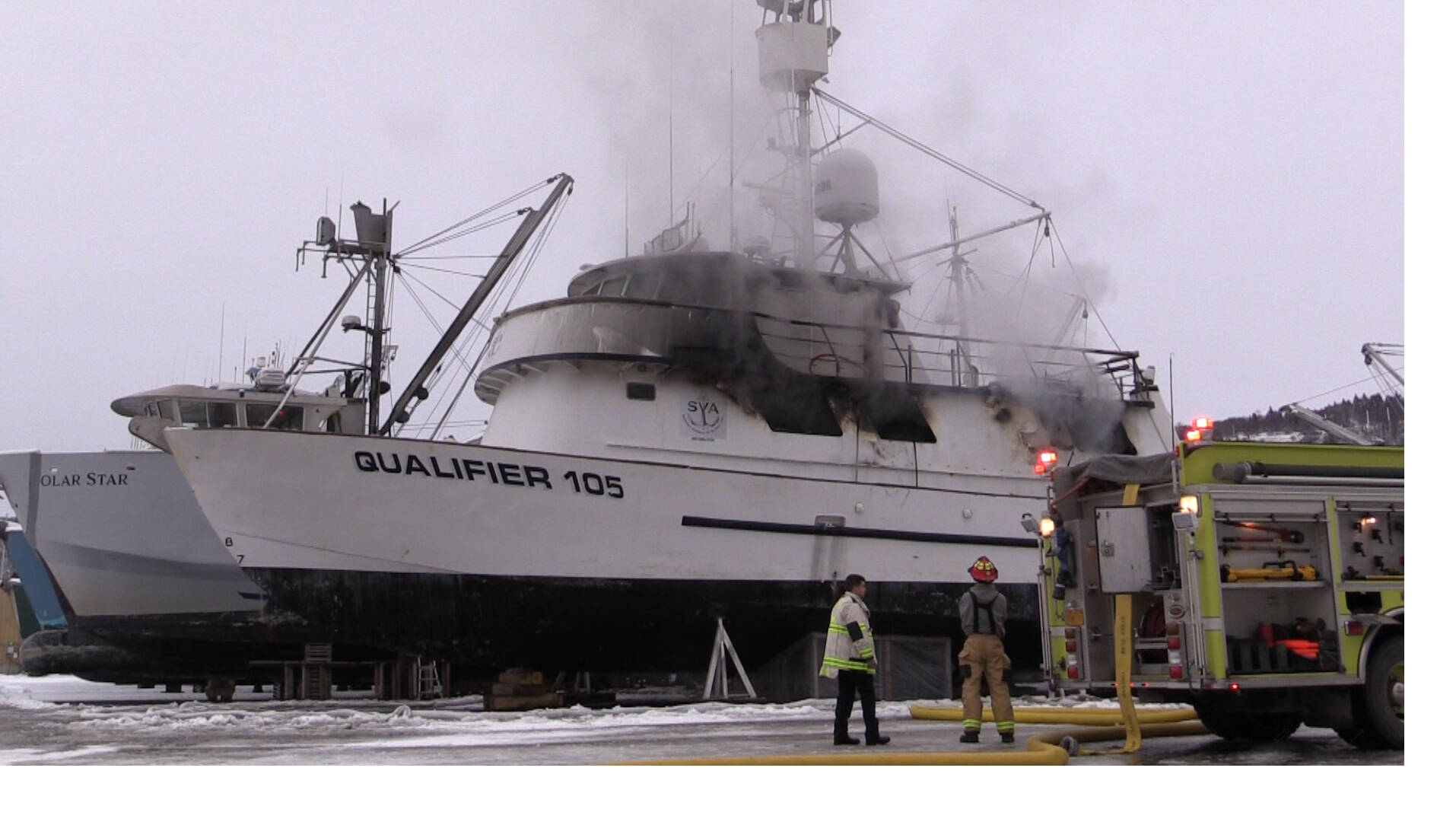 Photos by Nika Wolfe
Emergency personnel respond to a fire on R/V Qualifier, in the Northern Enterprises Boatyard on Kachemak Drive, Jan. 19.