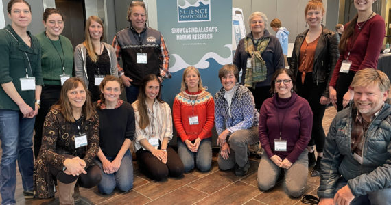 Some of Homer's AMCC attendees on Tuesday Jan. 24 at the Denai'na Center in Anchorage, Alaska. Back row L to R: Emilie Springer, Nicole Webster, Katie Gavenus, Reid Brewer, Marilyn Sigman, Kim Schuster and Serena Tierra. Front row L to R: Donna Aderhold, Lily Westphal, Debbie Tobin, Kris Holdereid, Lauren Sutton and Dan Olsen.  There were several others in attendance not included in this photo.   Photo taken by conference attendant.