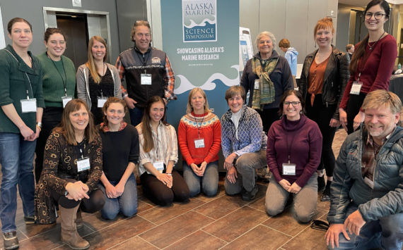 Some of Homer's AMCC attendees on Tuesday Jan. 24 at the Denai'na Center in Anchorage, Alaska. Back row L to R: Emilie Springer, Nicole Webster, Katie Gavenus, Reid Brewer, Marilyn Sigman, Kim Schuster and Serena Tierra. Front row L to R: Donna Aderhold, Lily Westphal, Debbie Tobin, Kris Holdereid, Lauren Sutton and Dan Olsen.  There were several others in attendance not included in this photo.   Photo taken by conference attendant.