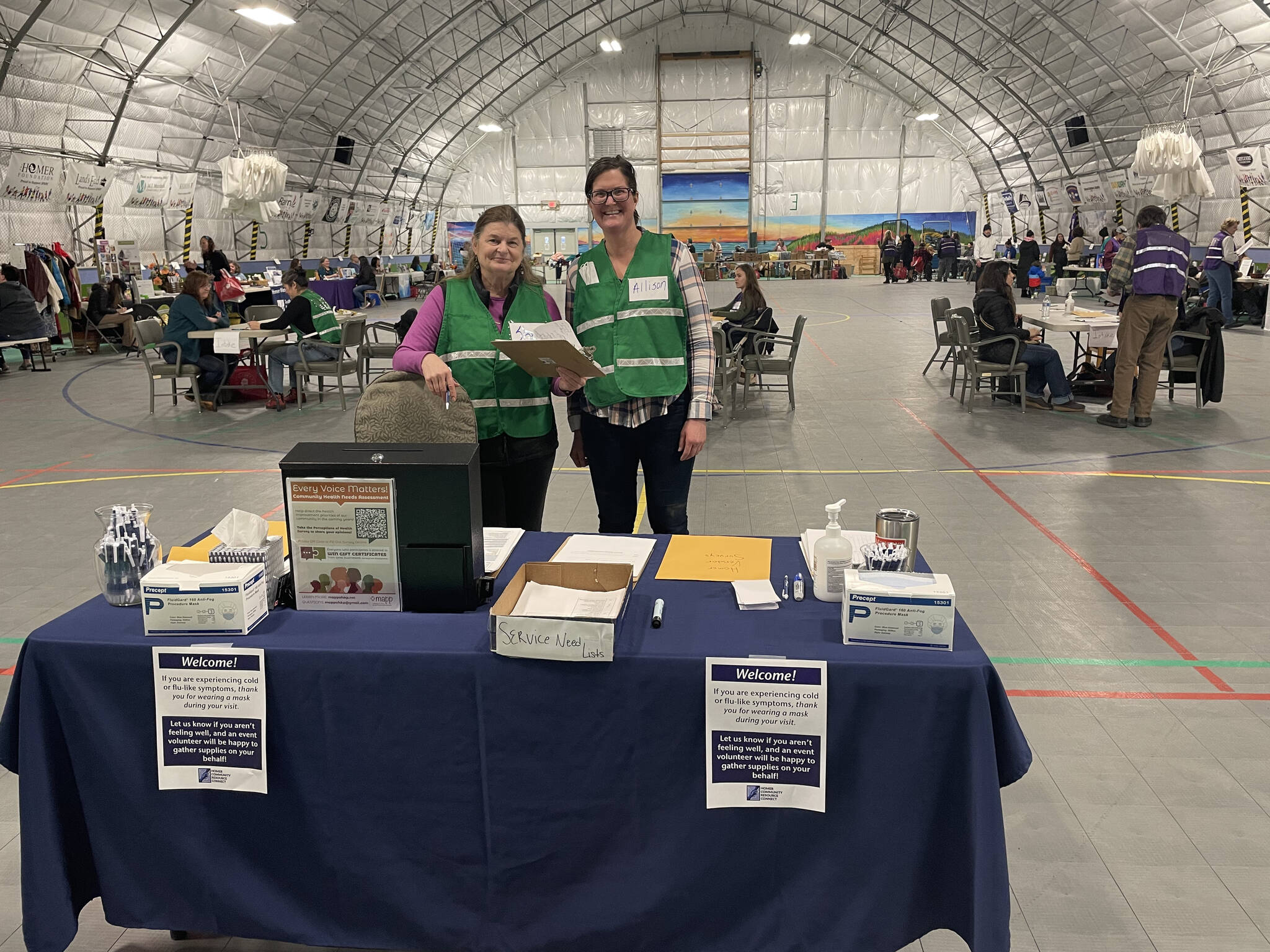 Allison O'Neil and Shari Daugherty serve as volunteers for Community Resource Connect at the SPARC Building in Homer, Alaska on Tuesday. Photo by Emilie Springer
