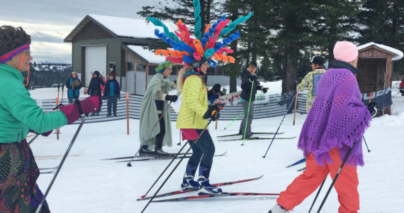 Krista Etzwiler skies dressed as a Dale Chihuly sculpture at the start of the Ski for Women on Sunday, Feb. 3, 2019 at the Lookout Mountain Trails near Homer, Alaska. Etzwiler won for best individual costume. (Photo by Megan Pacer/Homer News)