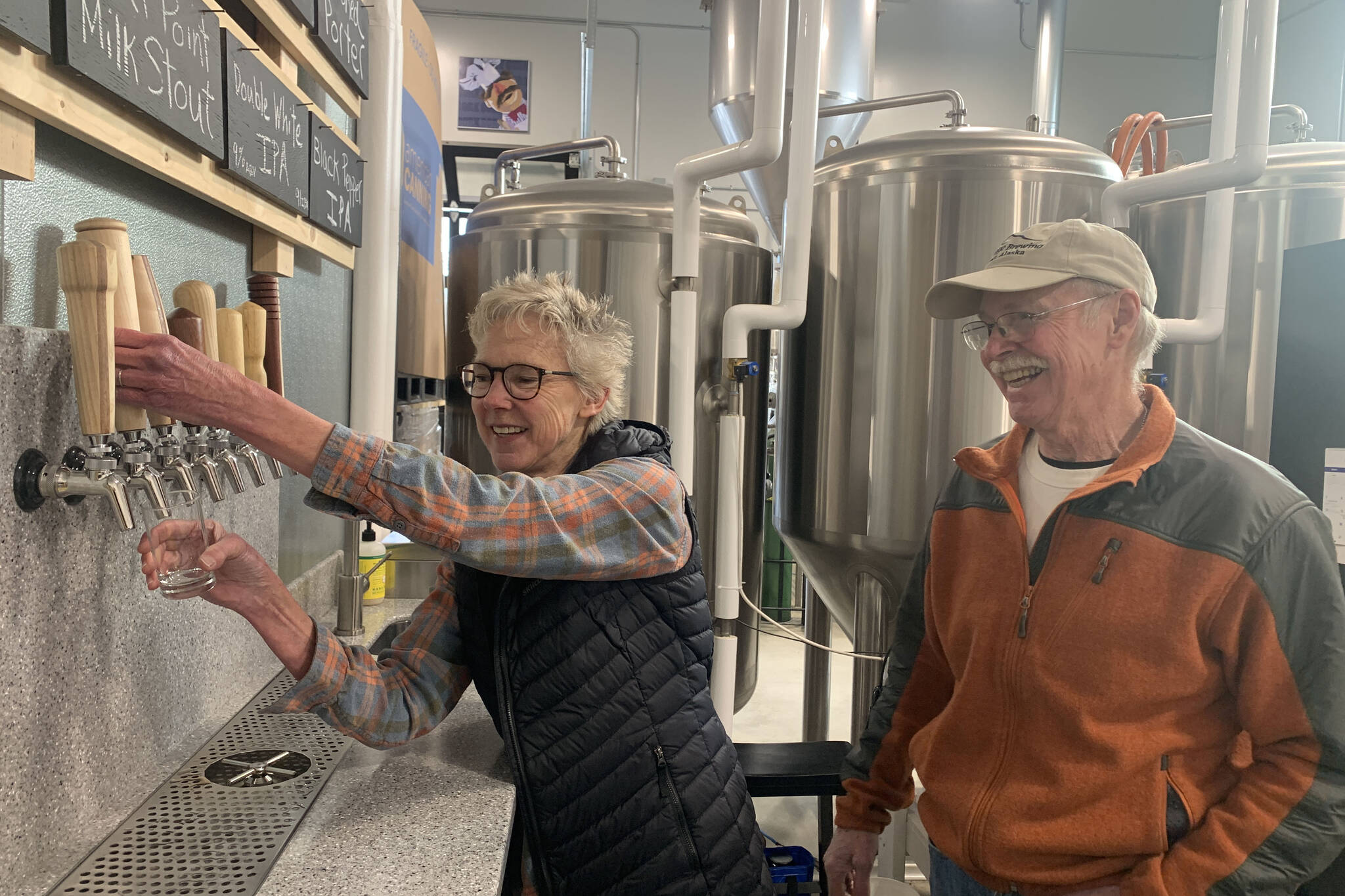 Sherry and Don Stead, owners of Grace Ridge Brewing, celebrate one year in their new location on Smoky Bay Way, Friday, Feb 3, 2023, in Homer, Alaska. (Photo by Christina Whiting/Homer News)