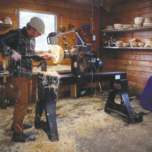 Photo by Brad Hillwig/courtesy
Woodworker Tony Perelli works in his Homer studio in this undated photo.