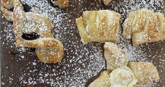 Puff pastry desserts are sprinkled with sugar. (Photo by Tressa Dale/Peninsula Clarion)