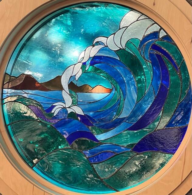 Adele Hile's stained glass window contribution in the Homer Public Library on Feb. 13, 2023. Photo courtesy of Mercedes O'Leary Harness.
