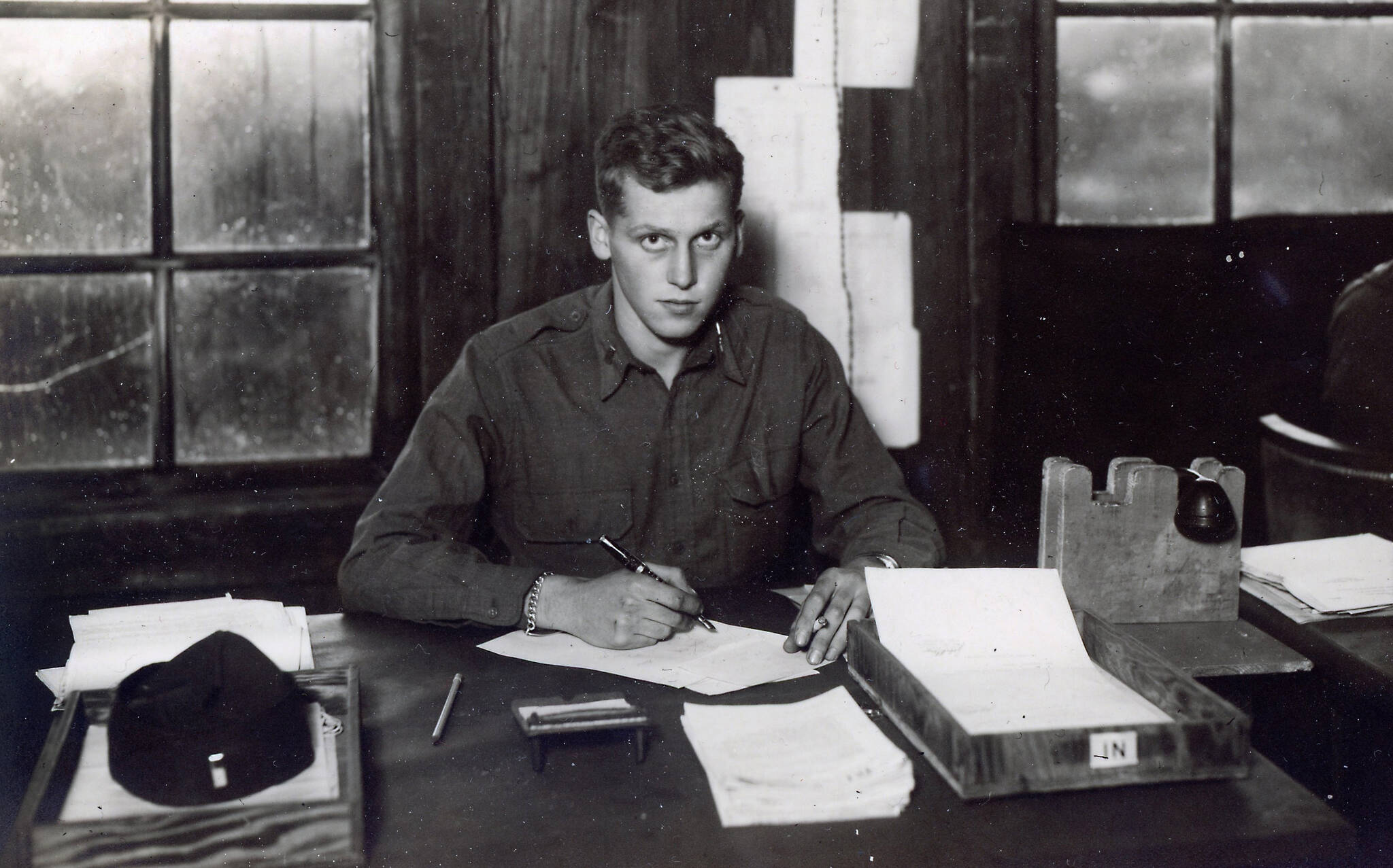 John Fenger, seen here performing office work in about 1944-45, served as a first lieutenant during World War II. (Photo courtesy of the Fenger Family Collection)