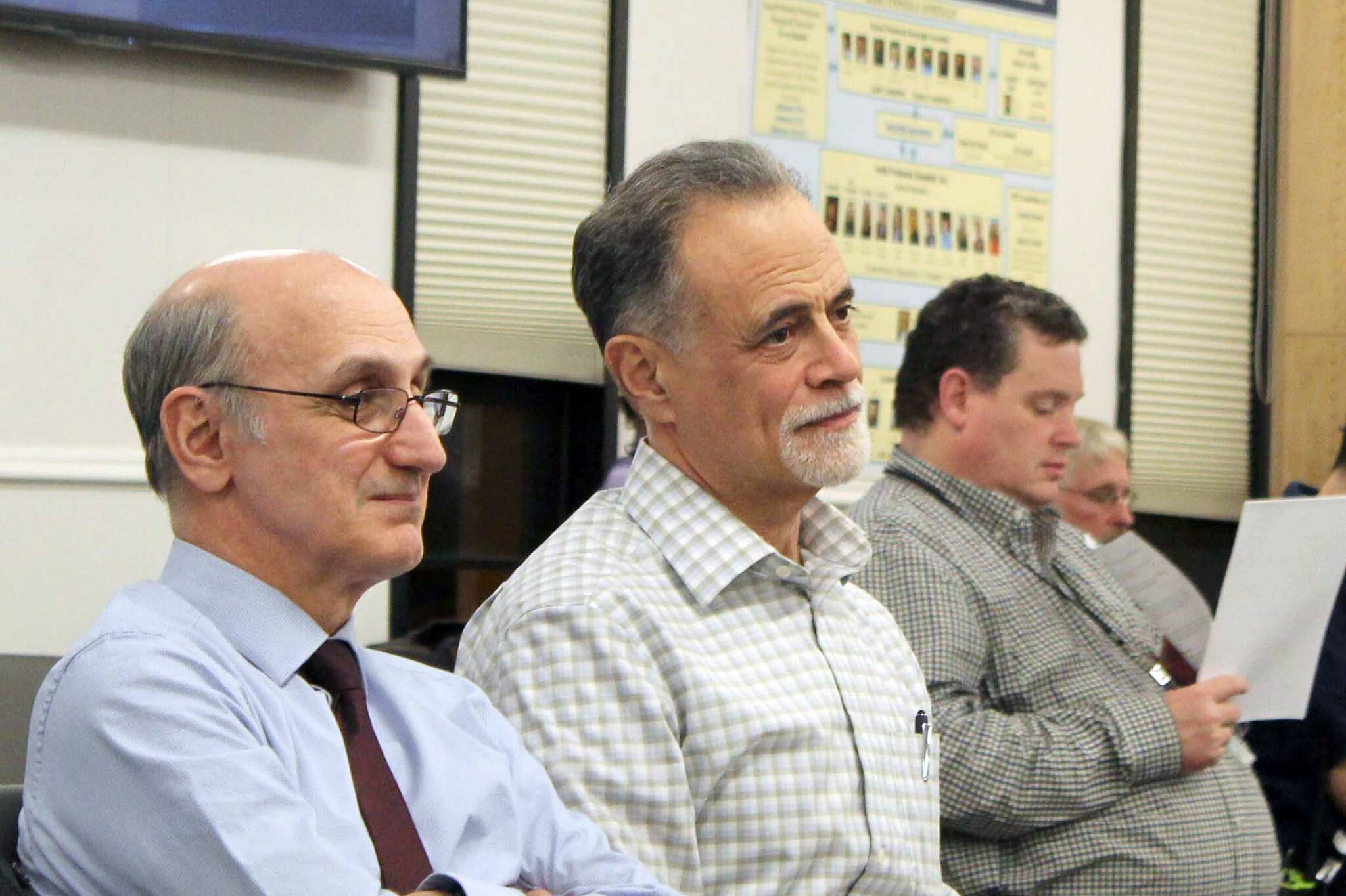 Peter Micciche (center) listens to the Kenai Peninsula Borough Assembly certify the results of the Feb. 14, 2023, special mayoral election, through which he was elected mayor of the Kenai Peninsula Borough, on Tuesday, Feb. 21, 2023 in Soldotna, Alaska. (Ashlyn O'Hara/Peninsula Clarion)