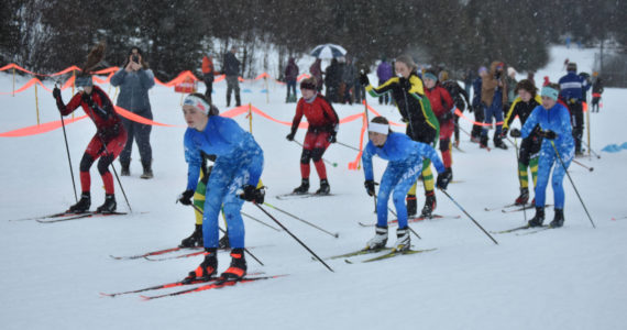 Skiiers from Kenai, Seward and Soldotna start the girls race during the Turkey Trot on Tuesday, Nov. 22, 2022, at Tsalteshi Trails in Soldotna, Alaska.