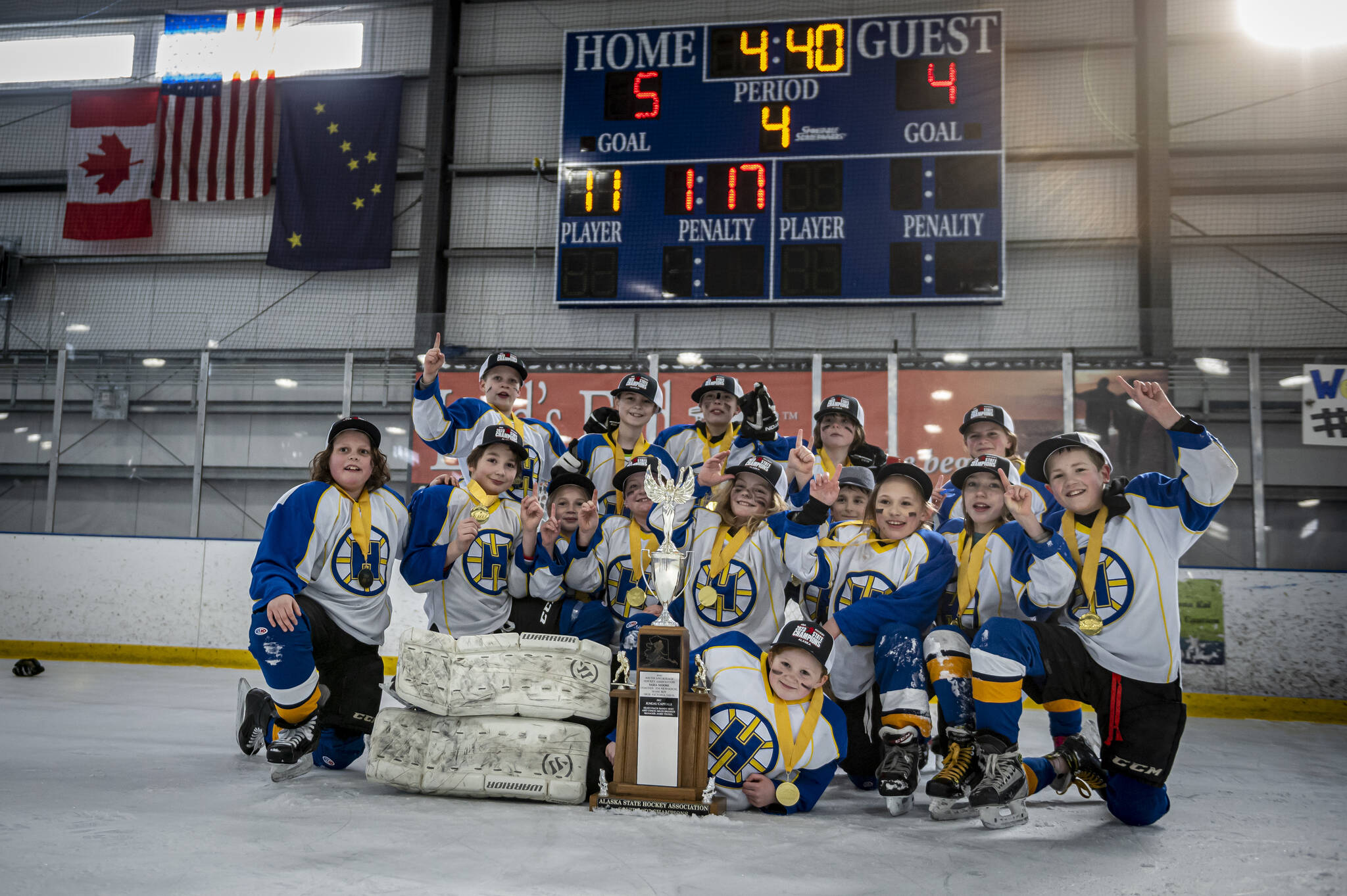 Photo by Scott Dickerson/courtesy
Homer Hockey Association for the 10 and under team take a division win in state tournament on Monday at the Kevin Bell Arena in Homer.