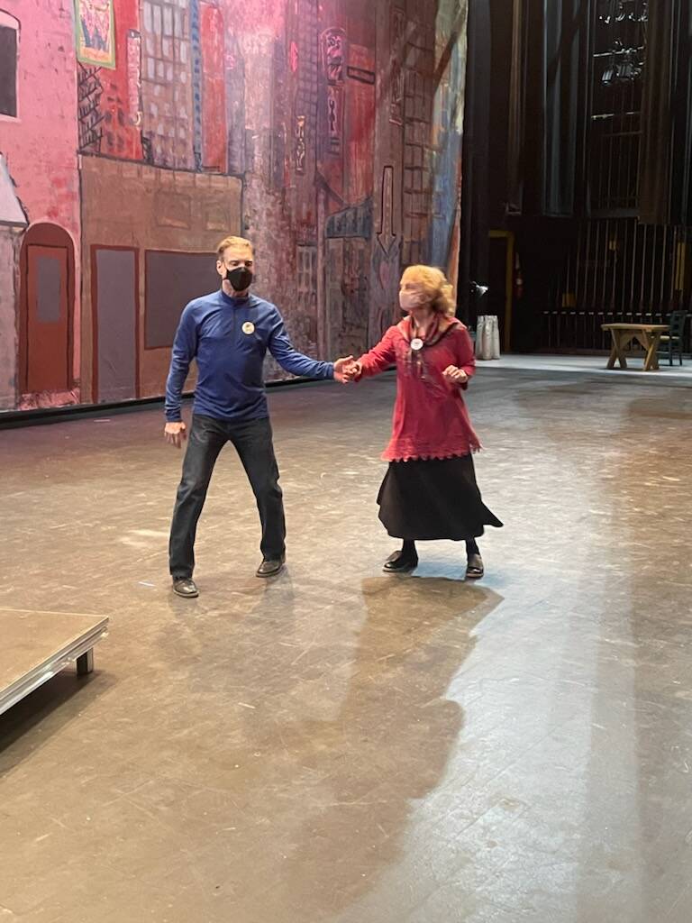 Judy Patterson and Terry Walsh prepare for Norwegian traditional dance workshop on Homer High School stage on Tuesday March 7, 2023. Photo by Emilie Springer