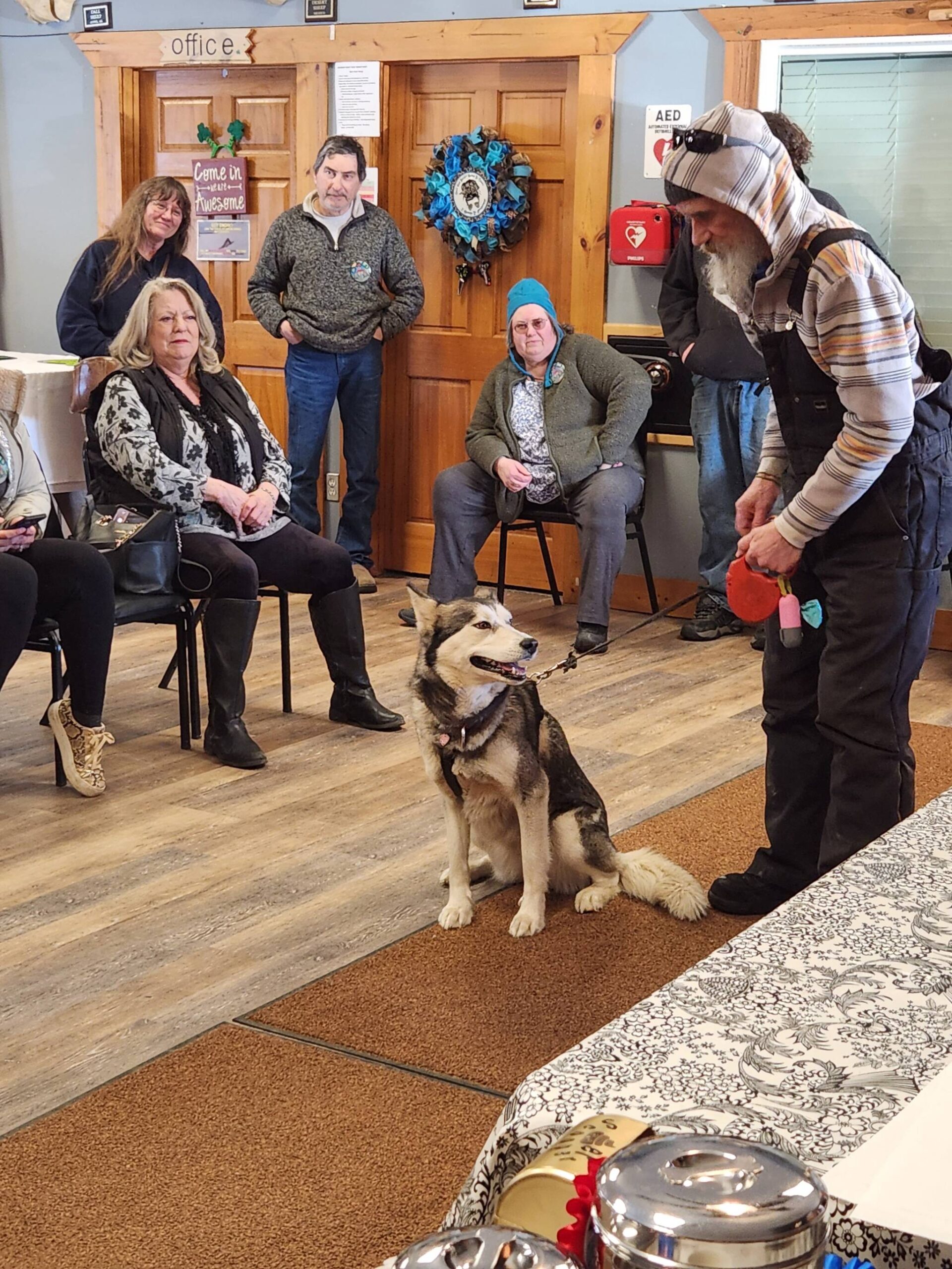 Allen Rasmussen shows his husky, Ayla, to the audience of the Snow Rondi dog show on Sunday, March 5 at the Anchor Point Senior Center in Anchor Point, Alaska. Ayla won an award for being the “dog that looks most like their owner.” Photo courtesy of Debbie Car