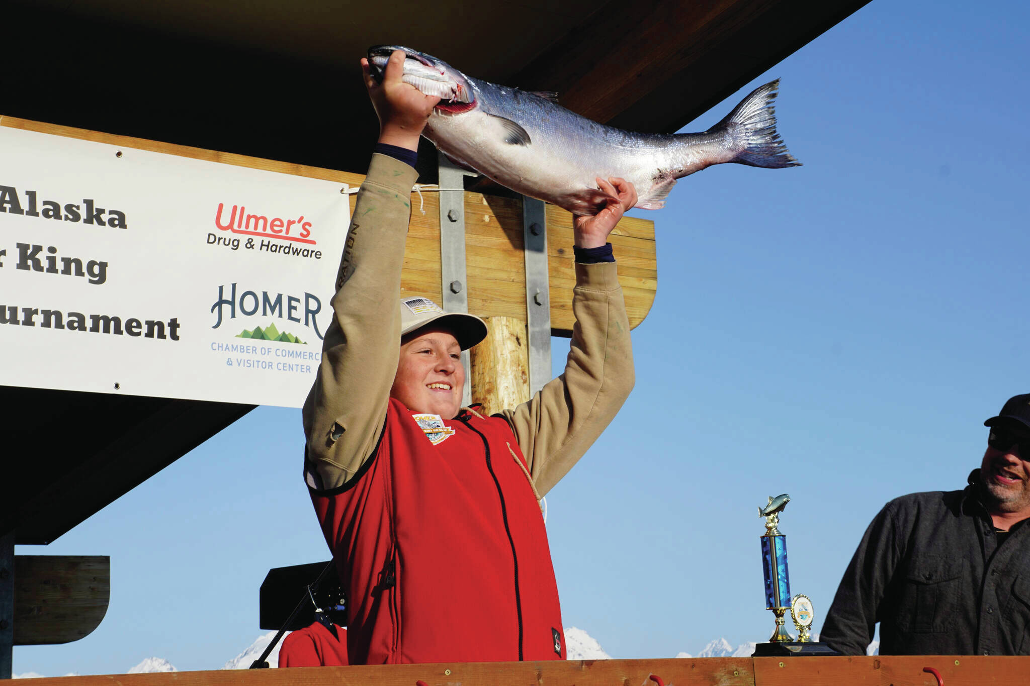 The 28th annual Homer Winter King Salmon Tournament winner Weston Marley holds up the 27.38-pound winter king salmon he caught on Sunday, April 10, 2022, in Kachemak Bay, Homer, Alaska. (Photo by Michael Armstrong/Homer News)