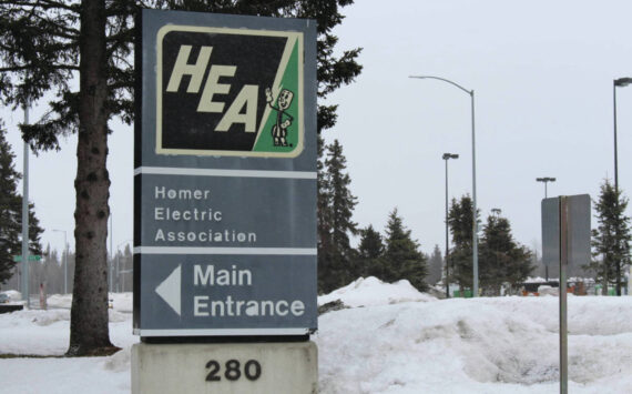 The sign in front of the Homer Electric Association building in Kenai, Alaska as seen on April 1, 2020. (Photo by Brian Mazurek/Peninsula Clarion)