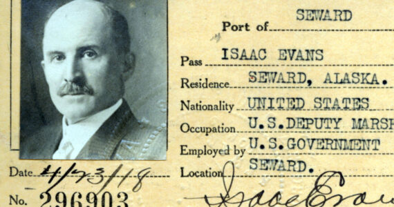 In 1918, a year before he would be gunned down on the streets of Seward, U.S. Deputy Marshal Isaac Evans posed for this photo on his Port of Seward waterfront pass. (Image courtesy of the Resurrection Bay Historical Society)
