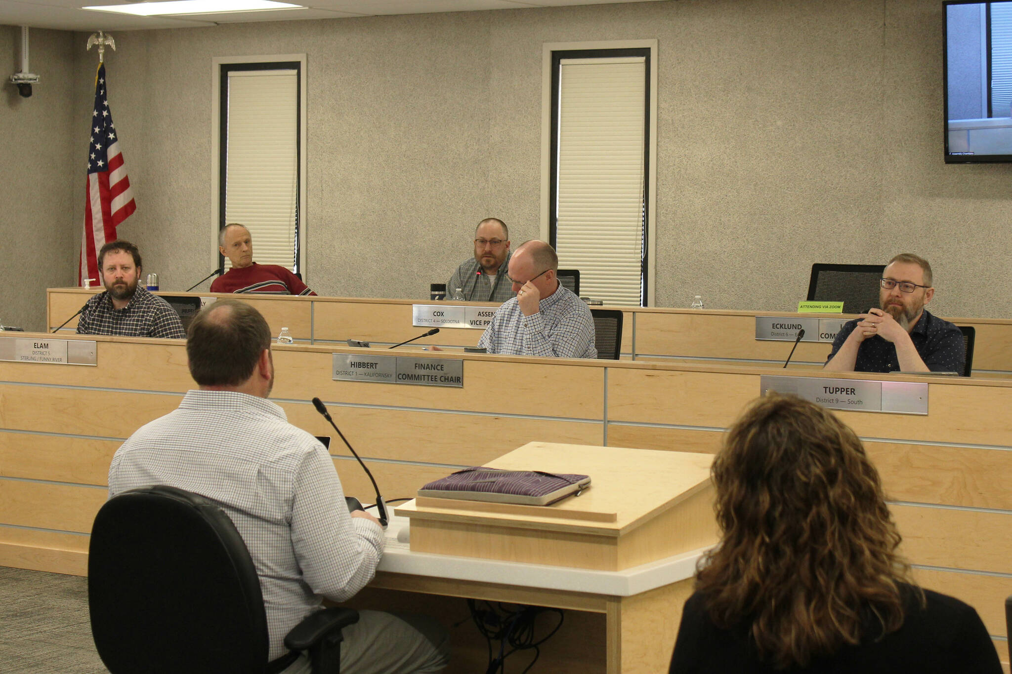 Ashlyn O’Hara/Peninsula Clarion
Foreground: Kenai Peninsula Borough School District Superintendent Clayton Holland, left, and KPBSD Finance Director Liz Hayes, right, speak about the district’s fiscal year 2024 budget during a work session with the Kenai Peninsula Borough Assembly on Tuesday, in Soldotna.